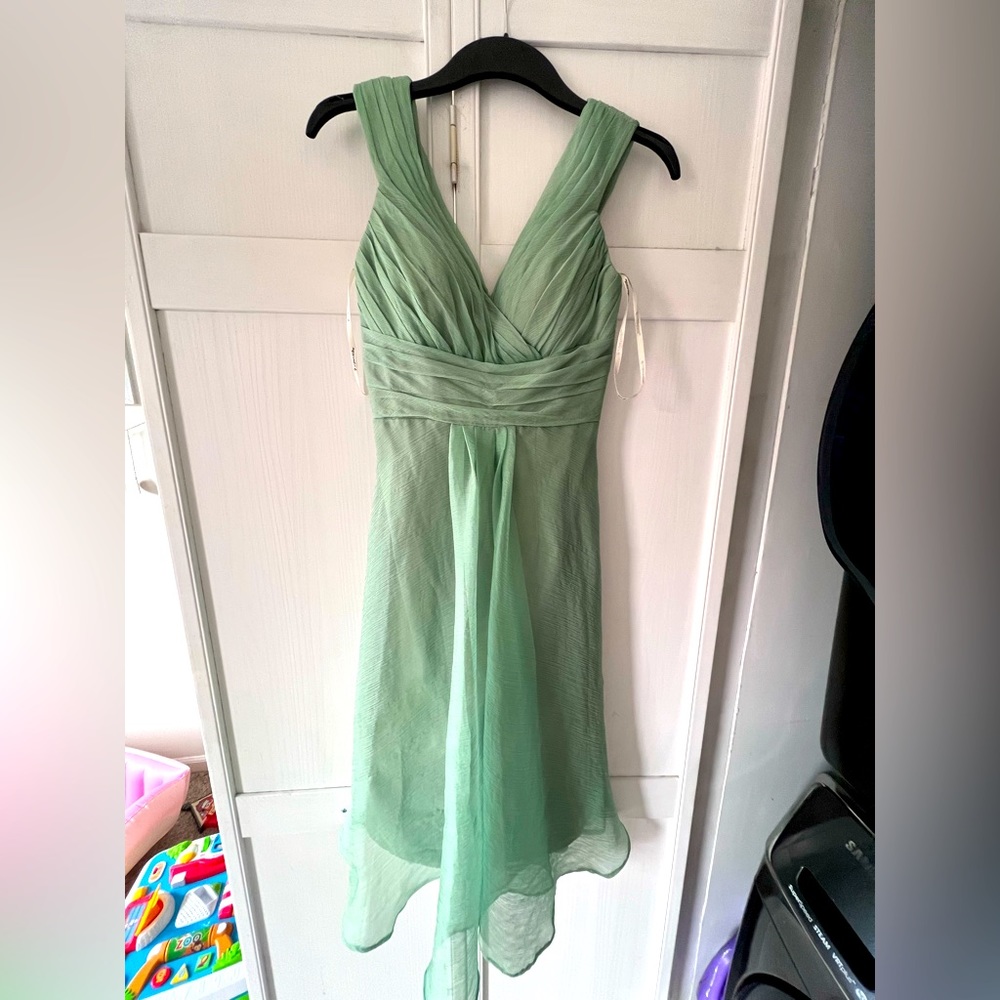 Green bridesmaid dress.